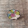 pin's hérisson fleuri